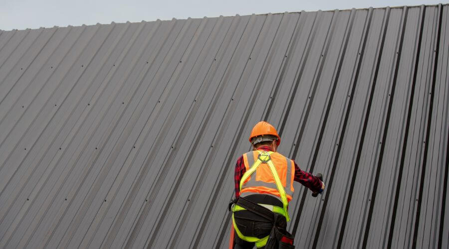 Professional metal roof installation services in Hoople, ND